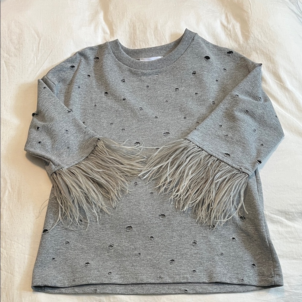 Distressed sweater